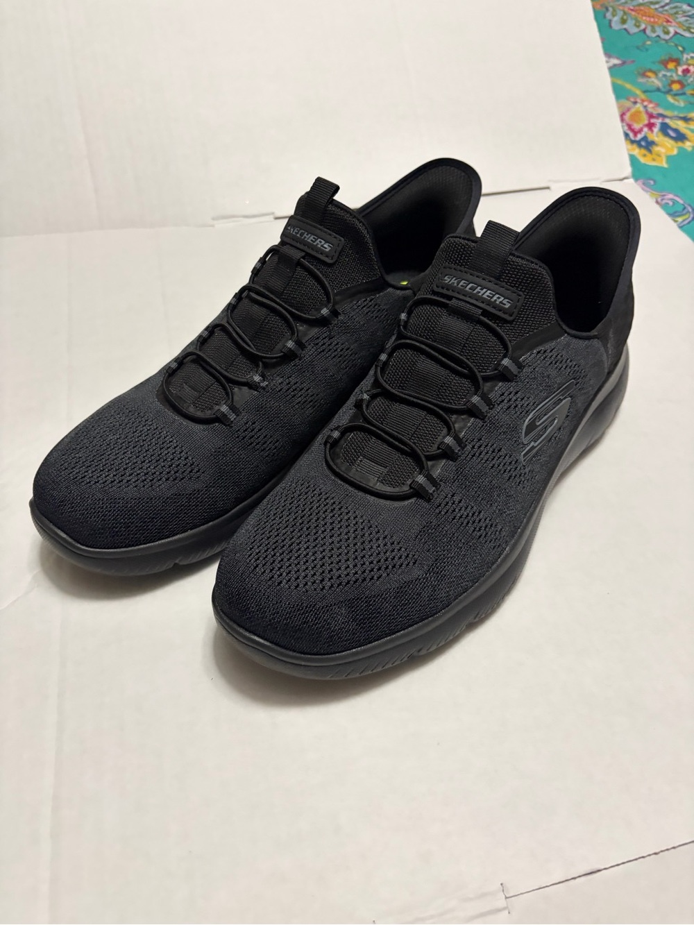 Skechers Men's All-Black Knit Slip-On Athletic Sneakers